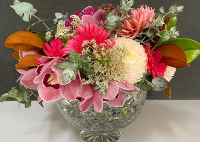 Table flowers in crystal bowl by Petal and Rose