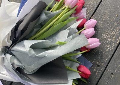 Tulips 'en masse' wrapped and styled by Petal and Rose